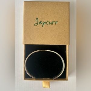 Silver cuff with arrow side details and, um, welll, interior inscription